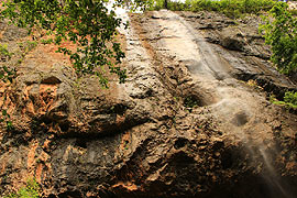 Неприступная скала с водопадом